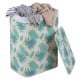 Bamboo clothes hamper with removable liner, featuring a green rainforest pattern, perfect for laundry organization.