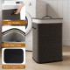 Bamboo clothes hamper with removable liner, solid metal frame, and side handles for easy carrying and laundry storage.