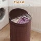 Bamboo laundry hamper with zippered lid, 19-gal capacity, ideal for keeping clothes tidy in bedrooms or bathrooms.