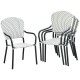 Set of 4 stackable patio dining chairs with armrests, made of weather-resistant PE rattan for outdoor use.