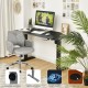 Adjustable electric standing desk in black featuring a sturdy heavy-duty base and cable management hole for organized.