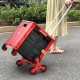 Foldable red utility cart with tri-wheels for easy stair climbing, adjustable handle, and compact storage for shopping.