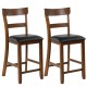 Counter height chair with a soft PVC leather seat and sturdy rubber wood legs, perfect for stylish and comfortable.
