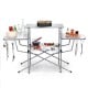 Foldable outdoor BBQ table with aluminum countertop, side shelves, and hooks, ideal for camping and backyard grilling.