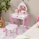 Toddler vanity set with detachable mirror, pink legs, and flower patterns, perfect for children's makeup and storage.
