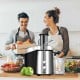 Electric juice press with stainless steel design, 75mm feeder chute, and safety lock, perfect for quick fruit and.