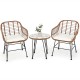 Two armchairs and a side table from the 3 Pieces Patio Rattan Bistro Set with white cushions for outdoor relaxation.