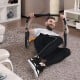 Portable exercise ab fitness crunch in use, featuring sturdy steel construction for home gym workouts and body.