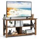 Modern farmhouse TV stand with open shelves, accommodating TVs up to 55 inches, featuring rustic design and cable.