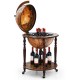 Globe wine cabinet with vintage pattern, sturdy MDF and wood legs, featuring wheels for easy movement and spacious.