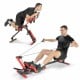 4-in-1 folding rowing machine with adjustable seat and control panel for versatile home gym workouts.