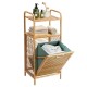 Tilt-out bamboo laundry hamper with 2-tier shelf, removable liner, and natural finish for easy access and storage.