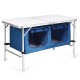 Height adjustable folding camping table in blue with large storage area and compact design for easy transport.