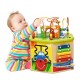 Colorful 7-in-1 wooden activity cube toy with bead maze, xylophone, and shape sorter for early educational play.