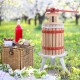 1.6-gallon fruit wine press made of oak wood and steel, ideal for making juice and wine outdoors.