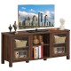 Walnut TV stand with tempered glass doors, 2-tier shelves, and storage cabinets for up to 65" TVs in a stylish living.