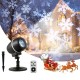 Outdoor waterproof Christmas snowflake LED projector light with remote control, ideal for creating festive snow scenes.