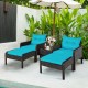 Two turquoise cushioned single sofas and ottomans in a brown rattan patio furniture set for outdoor relaxation.