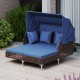 Outdoor daybed with retractable canopy in navy, featuring PE wicker rattan, cushions, and sturdy metal construction for.