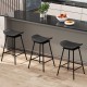 Set of 2 black swivel barstools with faux leather seats and footrests, ideal for kitchen islands or home bars.