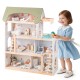 Wooden dollhouse with 33 furniture pieces, featuring movable stairs and a robust design for interactive play.