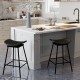 Set of 2 black swivel barstools with faux leather upholstery and footrest, ideal for kitchen islands or home bars.