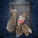 Hanging animated zombie prisoner decoration with glowing red eyes, sound activation, and detailed features for.