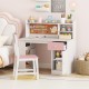 Kids desk and chair set in pink with hutch, storage shelves, and cork board, perfect for study and play in children's.