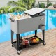 Portable patio cooler in gray with 80-quart capacity, bottom storage shelf, and bottle opener for outdoor gatherings.