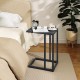 C-shaped side table in dark gray with a spacious tabletop, ideal for snacks and drinks beside a bed or couch.