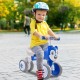 Blue baby balance bike with four wheels, lightweight carbon steel frame, and comfortable seat for safe riding.