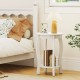Round white end table with rubber wood legs, featuring a 2-tier design for storage, perfect for bedroom or living room.