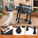 24-inch barrel charcoal grill with folding side tables, large wheels, and push handle for easy mobility and.