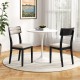 Modern dining chairs set of 2 in black with tilt backrest, featuring padded seats for comfort in dining room settings.