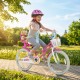 20-inch rose red kids bike with front basket, dual brake system, and adjustable seat for safe and fun riding.