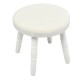 Round white stool with thick cushion, made of pinewood, ideal for a vanity set in a child's bedroom or playroom.