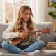 Soprano mahogany ukulele with adjustable strap, featuring 12 frets and clear nylon strings, perfect for beginners.