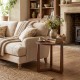 Round side table with sturdy rubber wood legs in walnut finish, perfect for rustic farmhouse living rooms or bedrooms.