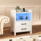 White nightstand with ambient LED lighting, featuring a built-in charging station and two drawers for stylish.