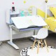 Kids multifunctional writing desk in blue with adjustable height, tilting desktop, and bookshelf for organized study.