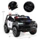 24V 2-seater ride-on police car in black with LED lights, megaphone, and remote control for kids aged 3 to 8.