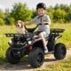 Child riding a black 24V electric ride-on quad with LED headlights, enjoying a day outdoors with a dog.