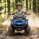 Electric 24V ride-on quad in blue features LED headlights, powerful motors, and wear-resistant wheels for outdoor fun.