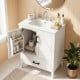 Modern 24.5" white bathroom vanity with sink, featuring two doors, a drawer, and ample storage for toiletries.