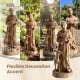 St. Francis statue with bird feeder in rustic brown, made from weatherproof magnesium oxide for garden or home decor.