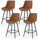 Close-up view of the textured faux leather on a 24-inch brown bar stool, highlighting its refined stitching and comfort.