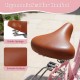 Ergonomic bike seat with elastic springs and smooth surface for comfort on the 24-inch pink beach cruiser bike.