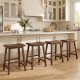 Set of 2 brown 24-inch counter height stools with ergonomic saddle seats, ideal for kitchen island seating.