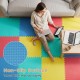 Multicolor interlocking EVA foam floor tiles with a non-slip surface, ideal for living rooms and home gyms.