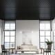 Black PVC slat wall panels with 3D fluted texture, ideal for modern living room decoration and easy DIY installation.
